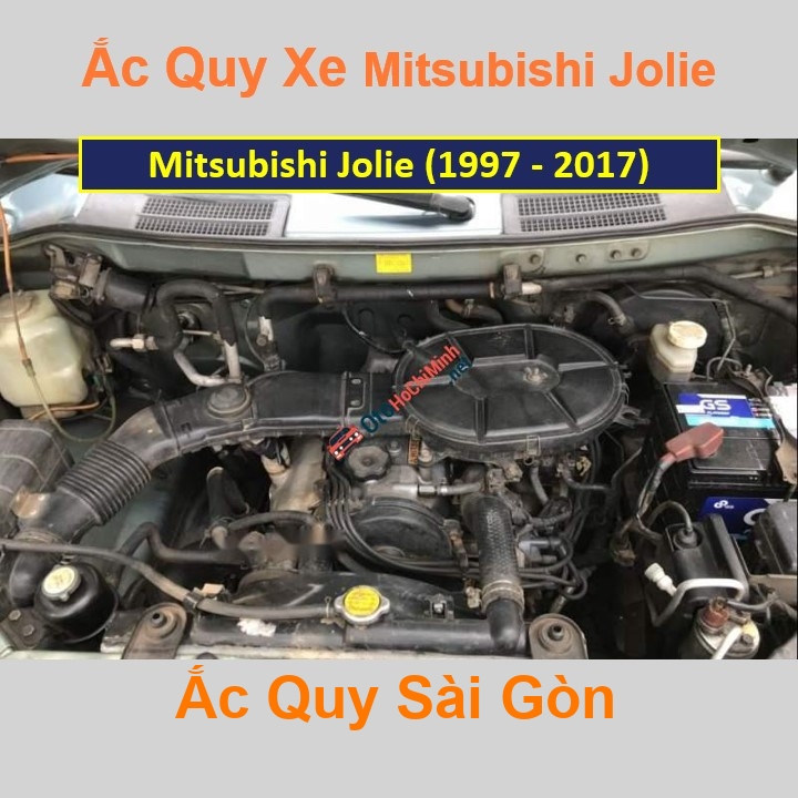 Vị trí bình ắc quy Mitsubishi Jolie ở dưới nắp ca pô, bình nằm ngang, giữa khoang máy, phía bên tài.
