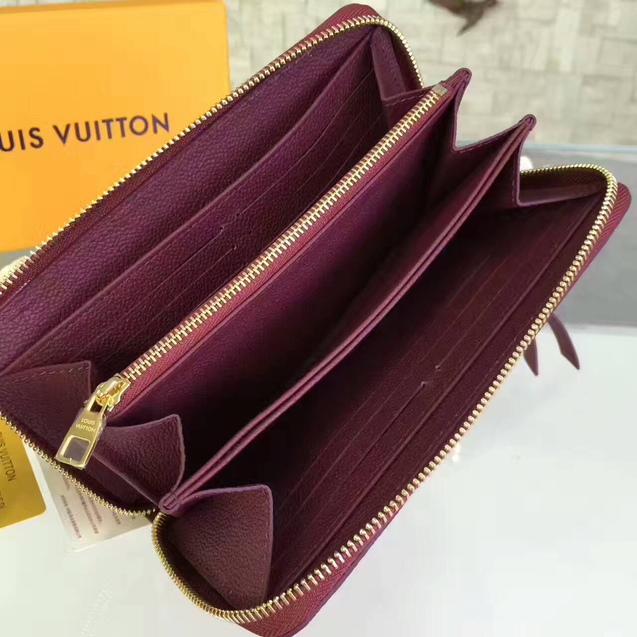 vi-nu-Louis-Vuitton-Monogram-empreinte-zippy-wallet-M64805-vnlv001(3)