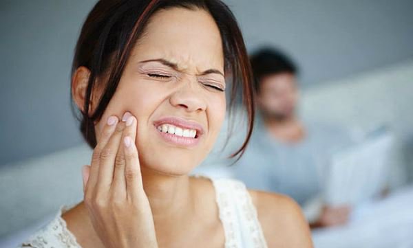Cẩn thạn khi nhổ răng khôn 1 tuần vẫn đau