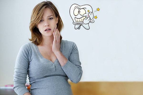 Tại sao phụ nữ mang thai hay bị đau răng khôn?